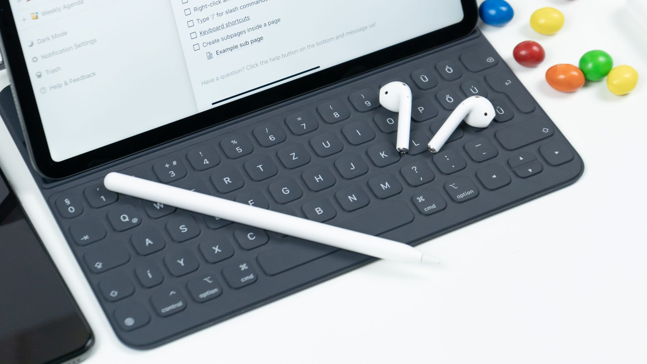 ipad pro keyboard and pen on a white table